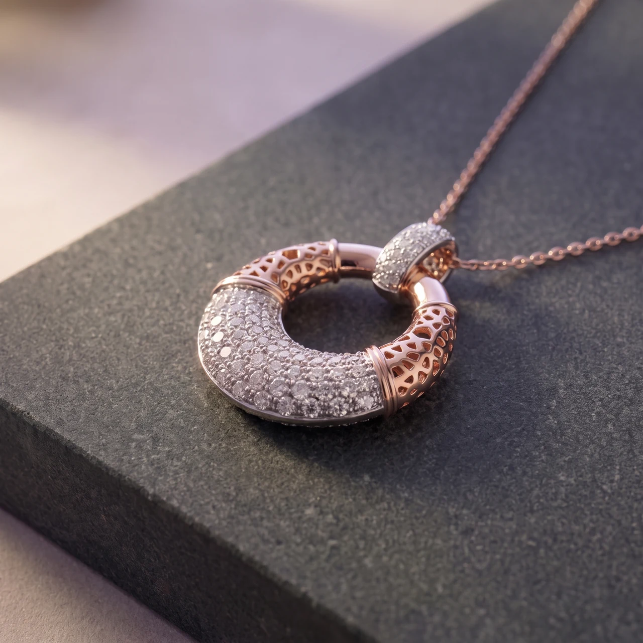 The Sinan Pavé Pendant in rose and white gold on honed stone